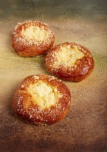 Bun with cottage cheese, pastries, cheesecake, no people