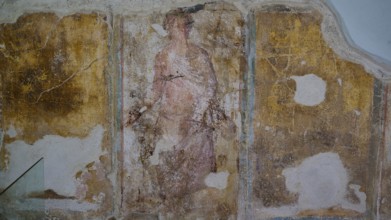 ©Udo Rein, Faded antique wall painting of a figure in warm colours, Casa Romana, Kos Town, Kos,