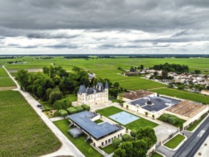 Chateau Pichon Longueville Baron Vineyard and grape fields around Pauillac from a drone, Bordeaux,