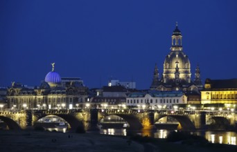 Dresden at the blue hour, view of the Church of Our Lady, art academy and Augustus Bridge, June,