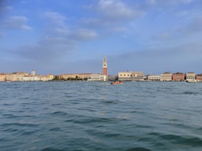 View over the lagoon to Venice with St Mark's Tower, lagoon city of Venice, Veneto, Italy