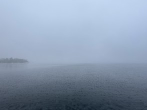 Fog over Lake Starnberg, Bavaria, Germany