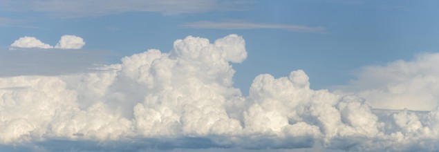 A large cloud in the sky. The sky is blue. The cloud is white.Bas rhin, Alsace, grand est, France