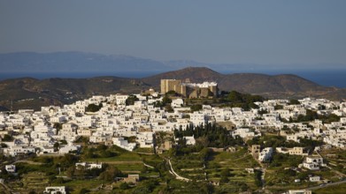 White houses against a mountainous backdrop with sea views, Monastery of St John the Theologian,