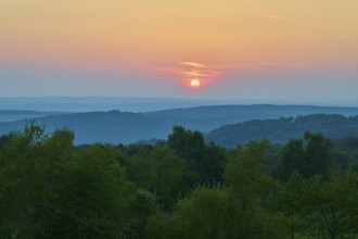 Pink sunset over wooded hills, quiet evening atmosphere, Geishöhe, Dammbach, Spessart, Bavaria,