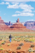Man walking in the desert, Valley of the Gods, Utah, USA, North America