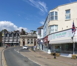 Shops in street of historic buildings, Piermont Place, Dawlish, south Devon, England, UK