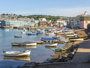 Small boats in harbour at Back Beach, Teignmouth, south Devon, England, UK