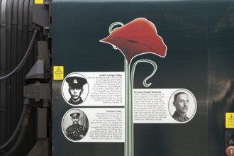 First World War remembrance staff biographies on side of Great Western Railway train, England, UK