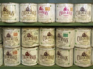 Tins of Colourman Paints displayed shelf, UK
