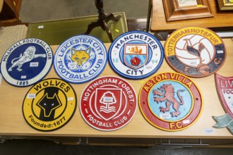 Metal replica football soccer club team crests or badges, Suffolk, England, UK