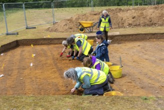 Time Team archaeologists excavating Garden Field at Sutton Hoo, Suffolk, England, UK 2025