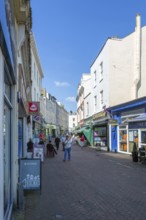 Pedestrianised shopping street in town centre, Bank Street, Teignmouth, south Devon, England, UK