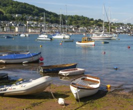 Small boats in harbour at Back Beach, Teignmouth, south Devon, England, UK view to Shaldon