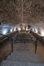 Old vault with chairs and atmospheric lighting, historical atmosphere, registry office, family