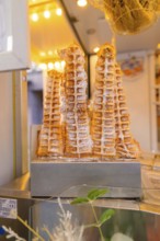 Fresh waffles with icing sugar at a market stall, Calw railway station festival, Black Forest,