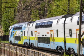 Train of the Austrian Westbahn en route on the winding railway line of the Geislinger Steige.