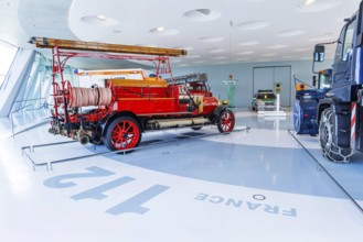 Gallery of helpers with rescue and police vehicles. The Mercedes-Benz Museum in Stuttgart presents