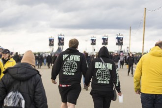 Festival visitor with Rock am Ring 2025 jumper at the Rock am Ring Festival on Sunday, Nürburgring
