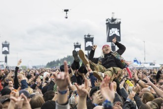 Festival visitor crowdsurfing at the Rock am Ring Festival on Friday, Nürburgring race track race
