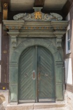 The Bürgersche Haus from 1639, entrance portal, with motto, coat of arms and ornamentation, Bad