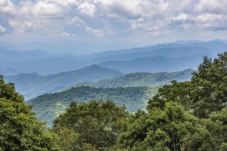 Smoky haze over the foliage on the mountainsides along the Blue Ridge Parkway in the Smoky