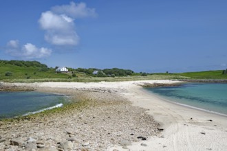 Expansive sandy landscape with views of tranquil bays and green hills, St Agnes, Isles of Scilly,