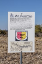 Sign indicating the location of the historical Old Spanish Trail auto trail across the United