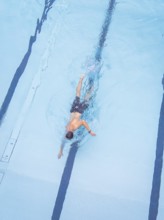 Close-up of a man swimming his laps in the pool, Calw outdoor pool, Black Forest, Germany