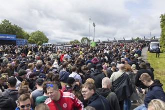 Festival visitors in front of the main entrance at the Rock am Ring Festival on Friday, Nürburgring
