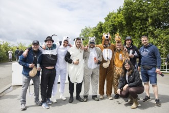 Festival visitors in animal costumes at the Rock am Ring Festival on Friday, Nürburgring race track