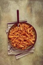 Fusilli pasta dish, made with tomato sauce, homemade, no people