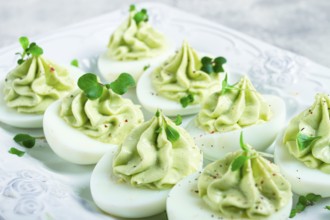 Snack, stuffed eggs with avocado, homemade, no people