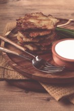 Potato pancakes, pancakes with sour cream, Belarusian dish, homemade, no people