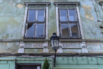 Historic lantern on a dilapidated house from the 19th century, Merias, Romania