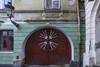 Wooden entrance gate of a 19th century house, Medias, Transylvania, Romania