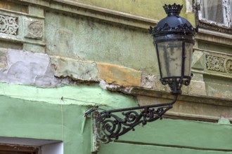 Historic lantern on a dilapidated house from the 19th century, Merias, Romania