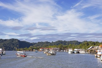 Boats in Livingston harbour on the Rio Dulce River, Izabal Department, Guatemala