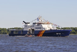 Decorated ship of the German Coast Guard and Federal Police BP 81 Potsdam leaves the Port of