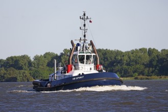 Vessel type tug VB Spirit leaves the Port of Hamburg on the Elbe, Wedel, Schleswig-Holstein,