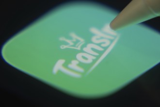 Dhaka, Bangladesh- 06 Dec 2025: Close-up of the Translr app on a screen with a stylus pointing at