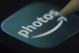 Dhaka, Bangladesh- 06 Dec 2025: Close-up of the Amazon Photos app on a screen with a stylus