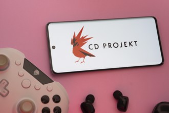 Dhaka, Bangladesh- 08 Apr 2025: A smartphone displaying the CD Projekt logo next to a gaming