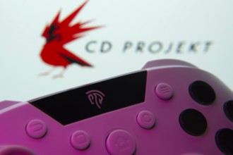 Dhaka, Bangladesh- 24 Mar 2025: A close-up of a gamepad with the CD Projekt seen on screen in the