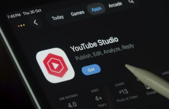 Dhaka, Bangladesh- 30 Oct 2025: Youtube Studio app displayed on a iPad screen in dark mode with a