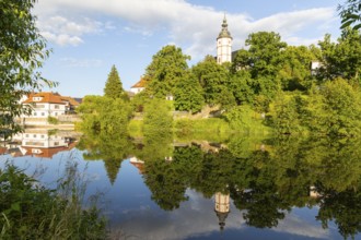 City view with church of Our Lady on the mountains and reflection in Zwickauer Mulde, Penig,
