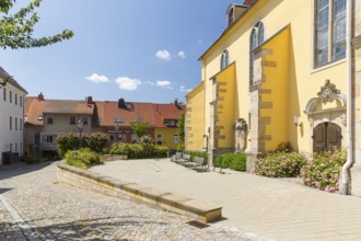 Church square with the town church of St. Nicolai in Pulsnitz, Saxony, Germany