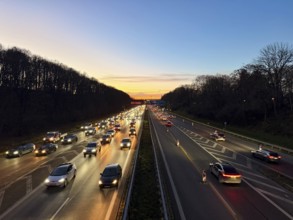 Cars driving on the motorway at sunset in the evening, Autobahn A96 Lindau, Munich, Bavaria,