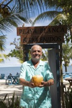 German manager, 67 years old, at Playa Blanca, Izabal Department, Guatemala