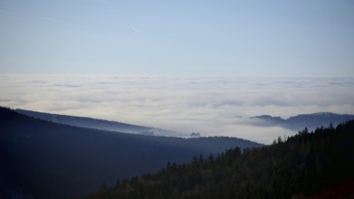 Mountains and hills covered in fog under a clear sky, Fichtelgebirge